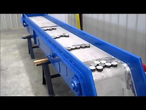 Magnetic Conveyor by Goessling USA moving 2.6 lb Steel Discs
