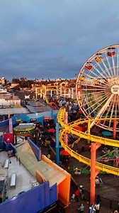 Santa Monica Pier and Beach at Sunset with Vibrant City Views