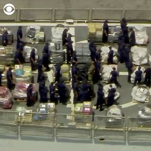 WATCH: 24,000 pounds of marijuana and cocaine worth an estimated $390 million was seized by the U.S. Coast Guard and docked in Florida on Tuesday https://cbsn.ws/2HQho8l | CBS News