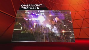 Protests erupt in Ferguson, Missouri after grand jury decision announced