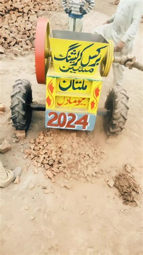 Traditional Brick-Making Machine in Action