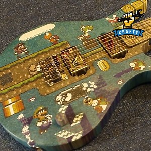 You can design and build a Super Mario guitar that actually works with 10,000 lollipop sticks. 🎸 #engineering | Crafty Engineer