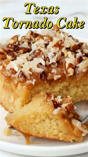 Texas Tornado Cake 🌪️🍍 This Texas Tornado Cake is the ultimate old-fashioned Southern dessert, packed with unbelievably moist crushed pineapple and drenched in a hot, buttery coconut-pecan glaze. Every bite is sticky, gooey, and rich in that classic homemade way we all crave. Whether you grew up eating this nostalgic treat or it's your first time, get ready to fall in love! Save this easy recipe for your next baking day and tag a friend who owes you a slice of this bakery-style beauty. Yield: 