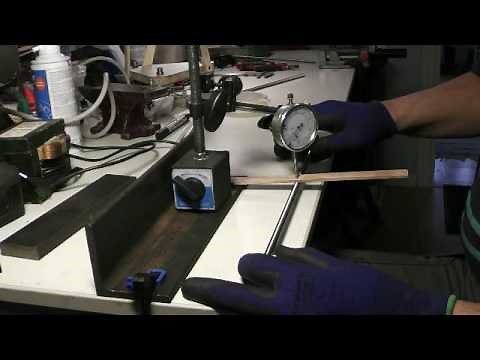 Straightening a threaded rod