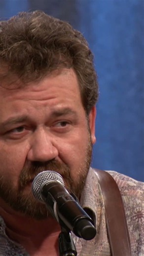 Dan Tyminski sings "Man of Constant Sorrow."