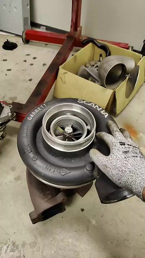 Exploring Garrett Turbocharger Components in a Workshop
