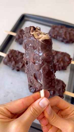 coffee almond crunch ice cream bars! they’re gluten free, dairy free, and refined sugar free, and the perfect summer dessert! recipe in the comments. #coffeeicecream #veganicecream #icecreambars #dairyfreeicecream #refinedsugarfree #healthyicecream #glutenfreedessert #almondcrunch #healthydessert | The Bigley Basics
