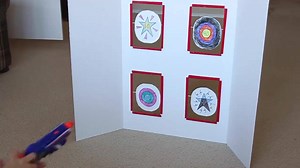 BUILD A NERF SPINNING TARGET! Here's how we made it: http://frugalfun4boys.com/2015/02/11/spinning-nerf-targets-diy-cardboard-toy/ | Frugal Fun for Boys and Girls