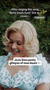 JoJo Siwa has posted a TikTok showing a glimpse of her new music video after she allegedly parted ways with her record label Columbia Records. JoJo dressed up as Hollywood icon Bette Davis, with a lot of her fans not understanding and this reference, and jumping to conclusions that she’s entering a “tradwife” era. #jojosiwa #recordlabel #bettedavis #chrishughes #cbb #cojo | Screenshot