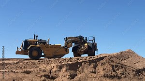 Earthmover working on highway construction