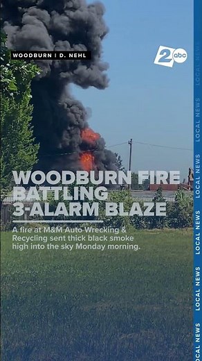 Fire crews tackle 3-alarm blaze at Woodburn auto wrecking business
