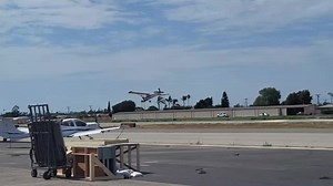 Planes Picking Up Banners in Low Swooping Action