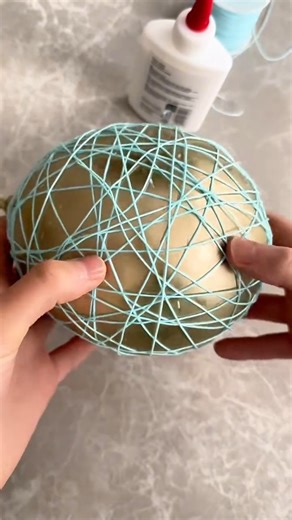23K views · 80 reactions | Who knew yarn and glue could make such elegant decor? ✨ Try this DIY string ball — super easy and aesthetic! #DIY #DIYProjects #Crafting #Handmade #DoItYourself #DIYDecor #CraftIdeas #EasyDIY #DIYInspiration #CraftingCommunity #DIYTutorial #QuickCrafts #CreativeDIY #LifeHacks #CreativeTips #HomemadeDecor #SmartLiving #HomeImprovement #Upcycling #EverydayHacks #DecorInspiration #IKEAHack #DIYFurniture #CustomOnABudget | Interior Decor World | Facebook