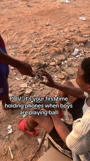 First Time Holding Phones While Boys Play Ball