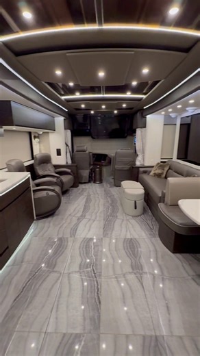 This 2023 Newell P50 is a quad slide with a bath and a half layout, has a Cummins 605hp diesel engine with only 37k miles and is priced to sell at $1,888,888. For more information on this beautiful coach, give us a call today! (941)-896-4819 | The Motorcoach Store
