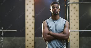 Workout, arms crossed and man serious for gym commitment, exercise routine or training performance. Body builder, fitness club and portrait of athlete ready for muscle building, challenge or activity