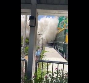 Onlookers flee while recording high-rise building collapse in Bangkok during earthquake