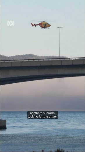 Police search for missing driver after car crashes on bridge | ABC News