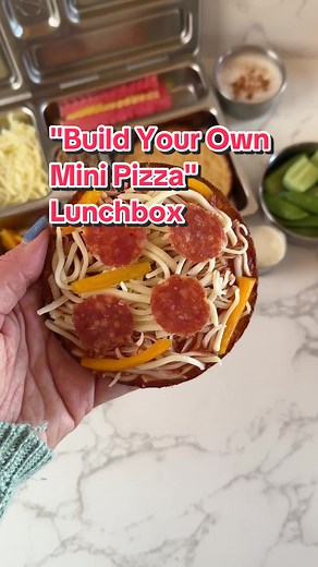 Build Your Own Pizza Lunchbox - this homemade take on a pizza lunchable is simple to make with only a handful ingredients and can be customized with any toppings you or your kids like! These mini pizzas can be enjoyed cold on-the-go or warmed in the air fryer, oven, or microwave. Today’s lunchbox: -Mini cauliflower pizza crusts, cooked pizza crust, pita bread, sandwich thins, or English muffin -Pizza sauce -Toppings of choice (I used pepperoni and sweet bell pepper) -Shredded mozzarella cheese -