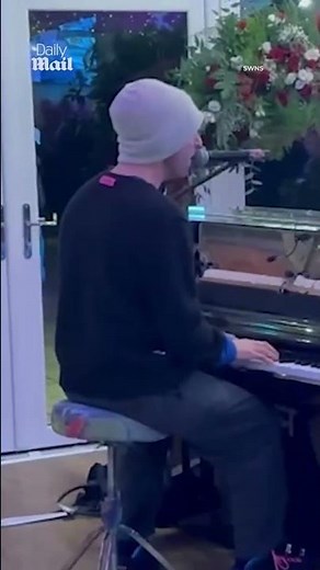 Coldplay's Chris Martin gives surprise wedding performance