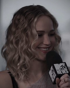 Jennifer Lawrence's Natural Hair: A Glowing Moment