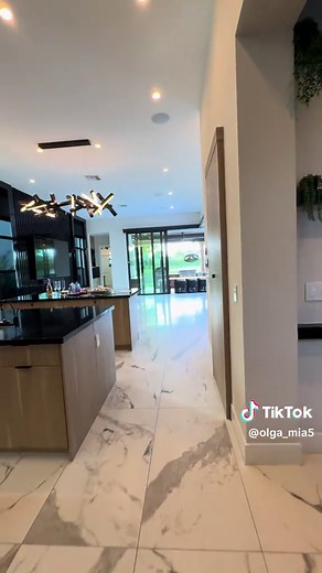 ✨ Unique upgrades in this luxury residence in Boca Bridges. Built in 2022, it feels less like a house and more like a private retreat. Mornings begin in calm light, afternoons drift by the water, and evenings glow beside the fire features of your custom Van Kirk pool. Inside, every detail was chosen with intention — private elevator, smart-home integration, four upgraded garages, and a primary suite made for true rest with spa-style baths and custom closets that make life feel effortless. A priv
