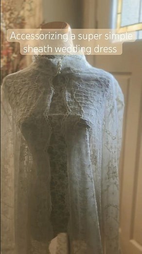 Accessorizing a super simple sheath wedding dress : lace bridal cloak