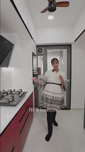 Modern Red & White Kitchen with Vastu and Smart Storage