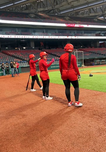 Female Baseball Players Practice in Texas Stadium