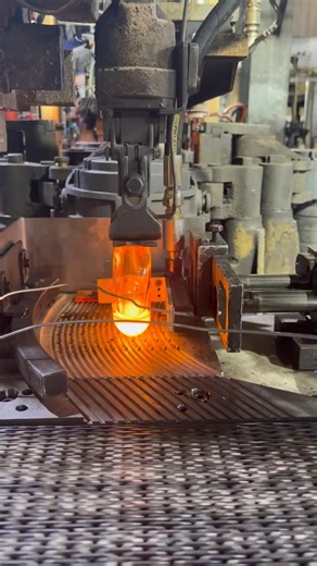 2000°F of Precision: How Glass Bottles Are Born ⚙️ ​Description: Ever wondered how a glass bottle is made? Here is the mesmerizing process straight from the production line. The glass is heated to extreme temperatures to become malleable enough for the mold. ​It’s amazing that this glowing block turns into crystal clear glass once it cools down! 🧊 ​#howitsmade #engineering #manufacturing #glassblowing #industrial #machinery #science #factorylife #process | Satisfying Glass Lab