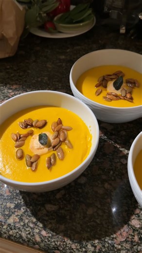 musashi & jasmine 👨🏻‍🍳👩🏻‍💻 on Instagram: "one of my faveeee soups!! recipe notes: 1 koginut (by @row7seeds not sponsored) 1/2 an onion 6-8 tablespoons of butter Honey 1 pint cream plus some milk salt and white pepper to taste Sage Neutral oil Pumpkin seeds Sweat the onions in the butter then add the cubed squash and honey (season a little bit with salt and white pepper as you add the onions and squash to the pan). Cook for a few minutes and then add dairy. Let the squash simmer in dairy fo