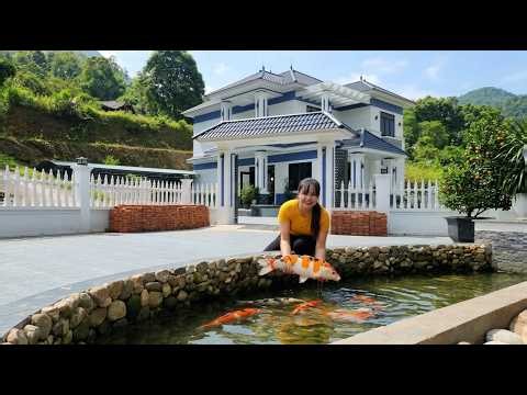 The new house is 100% complete, with koi fish added for decoration and flower beds.