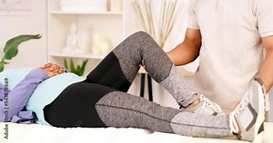 Physiotherapist, chiropractor and doctor check knee pain of woman athlete, fitness injury and first aid service in healthcare clinic. Physical therapy doctor stretching patient legs, muscle and body