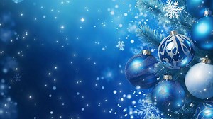 Download Christmas blue background. Branches of a blue spruce, Christmas tree decorations along the edge, it is snowing, lights are sparkling. for free
