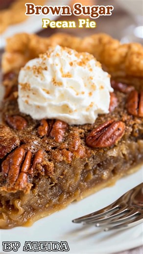 This Brown Sugar Pecan Pie is the perfect addition to your holiday table this year! 🥧 The filling is absolutely divine and it bakes up beautifully! Ingredients For the filling: 1 cup light brown sugar, packed ½ cup granulated sugar 1 cup light corn syrup (or golden syrup) ½ cup unsalted butter, melted 3 large eggs, lightly beaten 1½ tsp vanilla extract ¼ tsp salt 1½ cups pecan halves or pieces For the crust: 1 9-inch unbaked pie crust (homemade or store-bought) Instructions Preheat oven to 175°