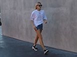 Legs eleven! Hailey Baldwin shows off slim pins as she shops