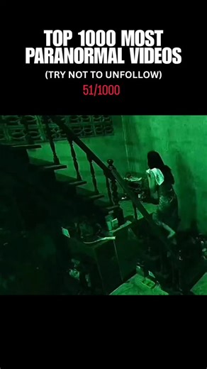 Paranormal Videos on Instagram: "The video is a chilling sequence captured through a green night-vision lens, which instantly creates an unsettling, supernatural mood. It begins with a person quietly ascending a set of wooden stairs, their movements suggesting a state of vulnerability in the dark. As they disappear into the upper floor, the camera lingers on the cramped, cluttered space beneath the staircase. From the deep shadows, a pale entity with long, matted hair slowly crawls into view. Th