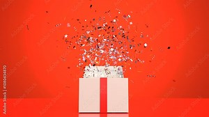 The gift box opens and colored confetti floats up