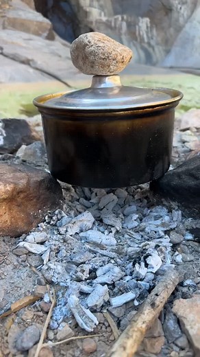 Cooking Outdoors: Metal Pot Over Campfire