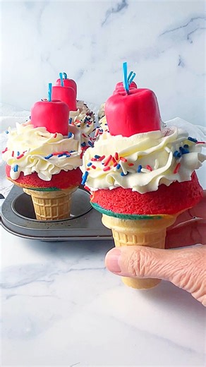 Firecracker cupcakes! 🎇 Great for New Year’s Eve or any party involving fireworks!🧨🧁Comment CAKE & I’ll send you the recipe! https://www.momlovesbaking.com/patriotic-firecracker-cupcakes-for-memorial-day-or-july-4th/ | Mom Loves Baking