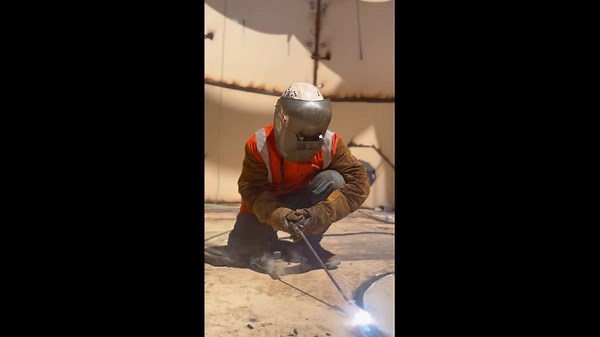 Man is welding with a 7024 rod!