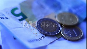 Euro paper money, coins. Macro presentation. Close up.