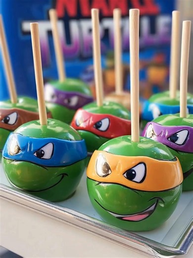 Teenage Mutant Ninja Turtle Candy Apples Shiny green candy apples decorated with turtle mask faces for a fun themed treat. Yield: 8 apples Cook Temp: Hard crack stage (300°F / 150°C) Time: 25 minutes cook 30 minutes set Key Ingredients First: 8 Granny Smith apples ................................. Full Recipe in First Cօʍʍеոτ 👇 | Healthycutmeals by Claire