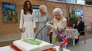 Watch the Queen cut a cake with a sword