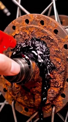 Rust clings hub spokes stretch polished core gleams