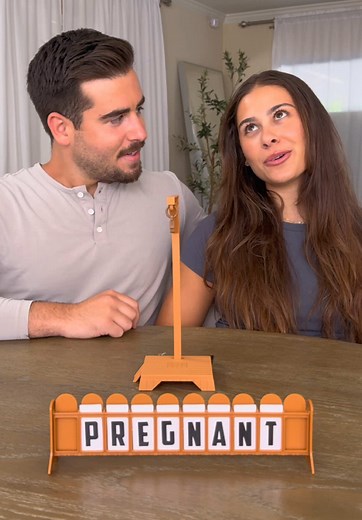 Hangman Board Game Fun: Guessing Letters and Laughter