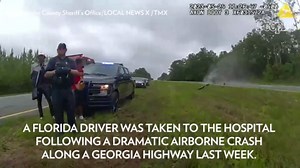 Driver Survives After Car Flies Off Tow Truck Ramp and Vaults into the Air Before Crashing