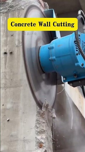 This excavator-mounted rock saw can easily cut through concrete walls.