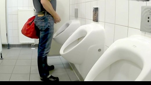 Truckers pissing in autohof toilet