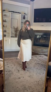 Elevated winter look from my latest Amazon unboxing ✨ This green cashmere sweater paired with a cream satin skirt feels so chic and polished — and the brown boots pull the whole outfit together beautifully 🤎 Comment LINK and I’ll send you everything from the video! @amazonlive #amazonmusthaves #midsizestyle #amazonhaul #amazoninfluencer #tryonhaul2025 | Brittany Johnson